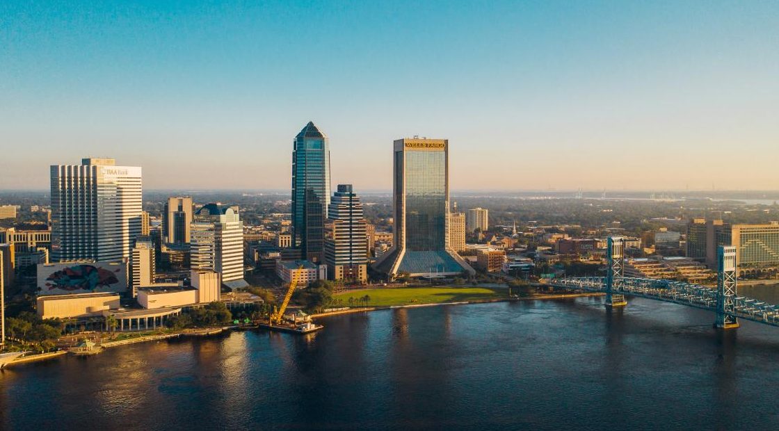 city skyline under blue sky during daytime