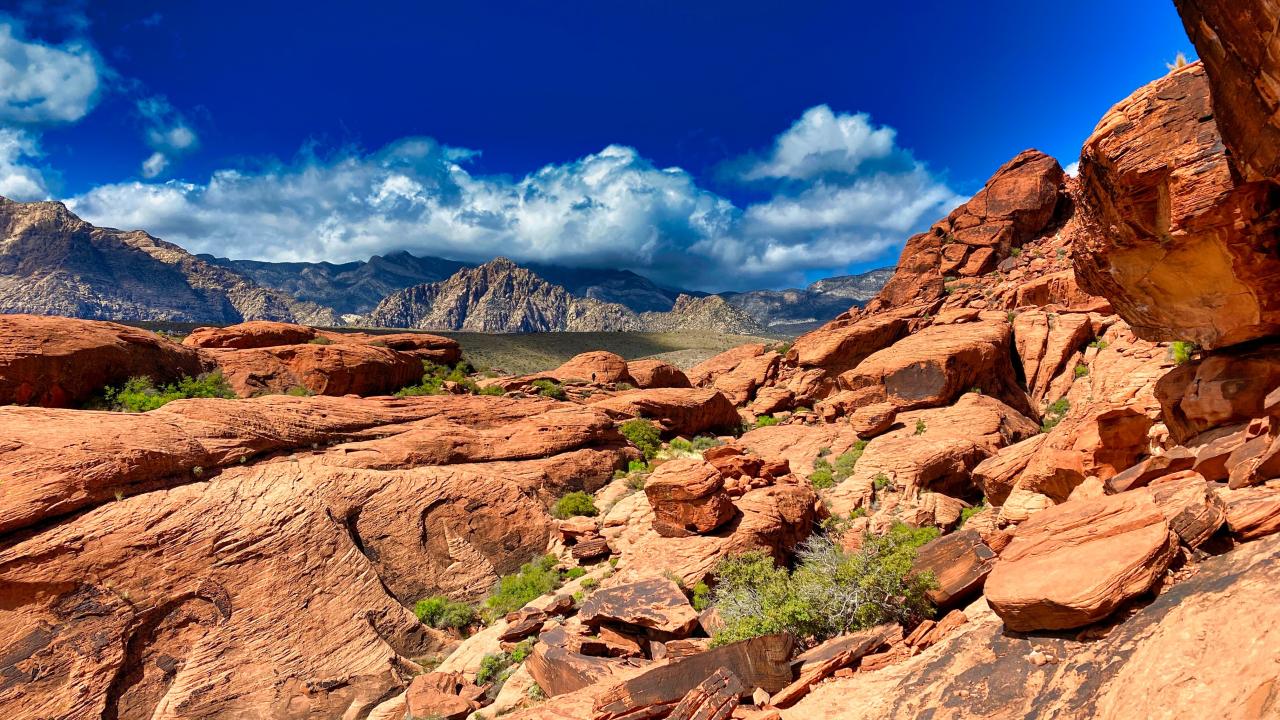 brown rocky mountain under blue sky during daytime